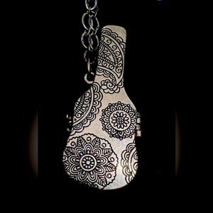 guitar locket on 38” adjustable length necklace from lucky brand